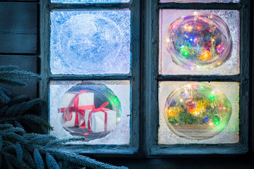 Adorable gifts for Christmas in frozen window