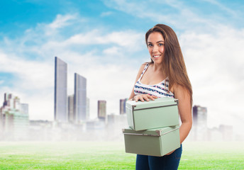 portrait of a girl holding a vintage boxes