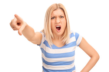 Angry blond woman scolding someone