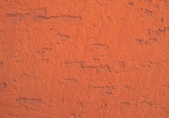 The structure of the concrete surface is painted orange