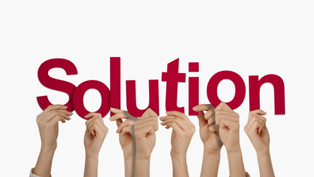 Hands holding up solution