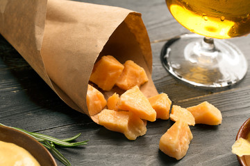 Pile of cheese and glass of beer © zakiroff