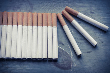 Cigarettes on Grunge Wood
