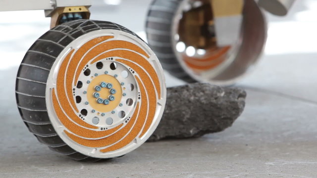 Close up of a Mars space rover's wheels.