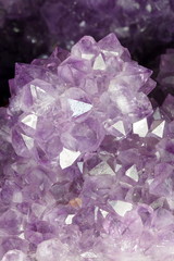 Natural amethyst crystal background. Amethyst is a violet variety of quartz - 97299957