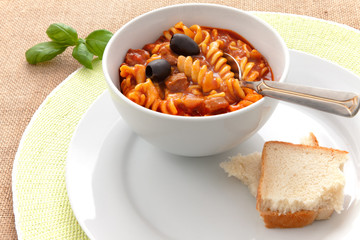 Thick soup with pasta and tomatoes