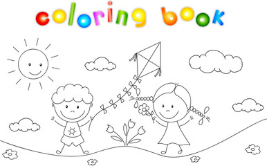A boy and a girl playing in the meadow and launching a kite. Col