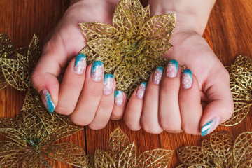 Winter nail art with snowflakes and light blue french