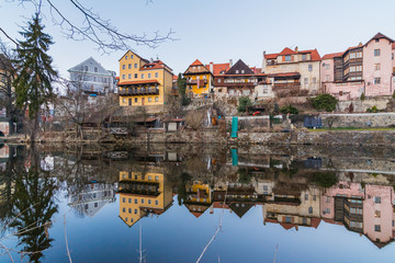 Tradicional colorful houses in Cesky krumlov reflected in the river