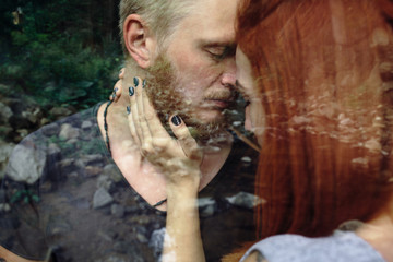 beautiful couple on the background of forest