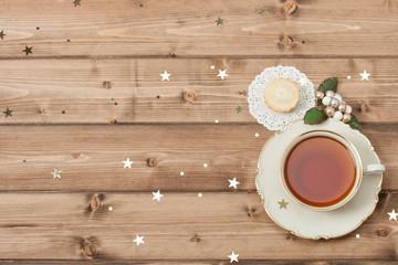 Cup Of Tea. Mince Pie. Shining Stars. Wooden Background With Cop
