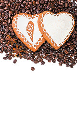 Gingerbread heart on  coffee beans background.