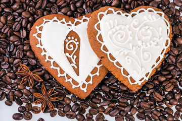 Gingerbread heart on  coffee beans background.