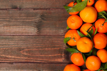 background Bunch of fresh mandarines oranges on market