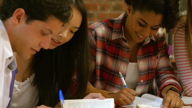 Students revising together in the library