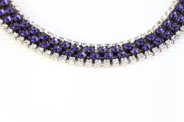 Beautiful blue string of beads isolated on white background