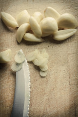 Slicing Fresh Pealed Garlic Cloves