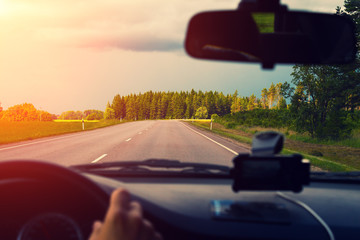 Driving a car on asphalt road