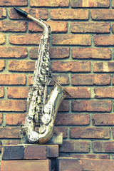 Fototapeta premium Saxophone Brick Wall