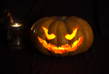 The sinister pumpkins for Halloween candles around 
