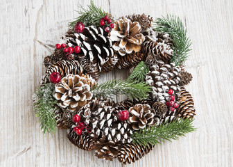 Festive Christmas Wreath on Wooden Background