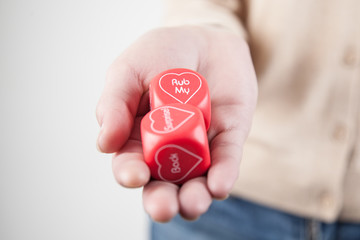 Woman holding valentine's day cube
