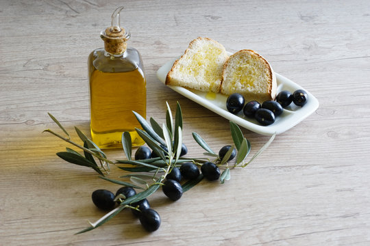 Bodeg&oacute;n con  pan y aceite de oliva virgen extra