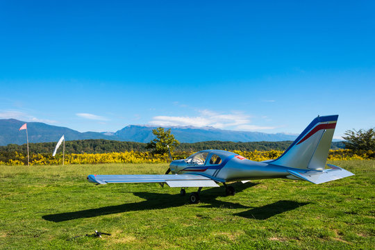 A single-engine plane on a small field, Abkhazia.
