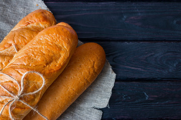 loaf on a napkin on a black background