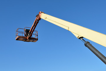 aerial platform against a blue sky