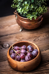 Grapes in a wooden bowl.