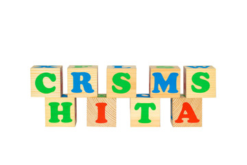 Wood cube with inscription CHRISTMAS 