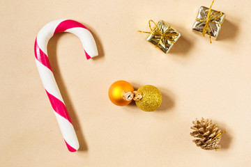 Christmas candy cane on a kraft paper as a holiday background
