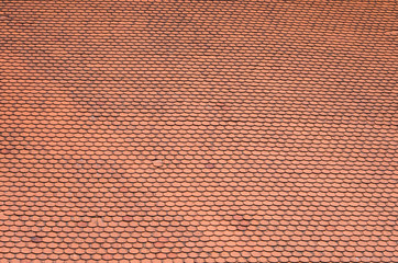 Red tiles roof background