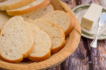Freshly sliced bread platter with butter.