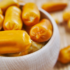 Fototapeta na wymiar Cheese snacks in wooden bowl
