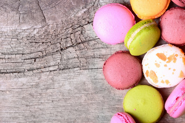 macaroons variety on wooden background