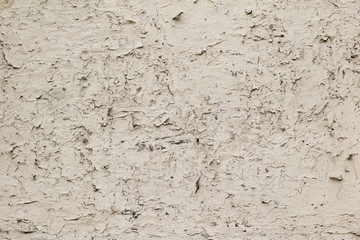 Peeling and cracked paint on an old wall