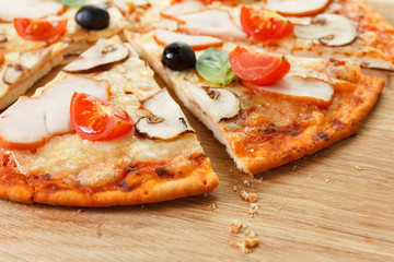 Sliced Pizza with mushrooms and vegetables