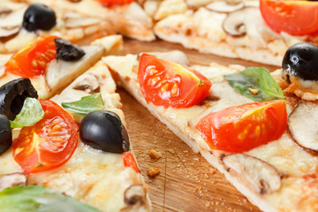 Sliced Pizza with mushrooms and vegetables