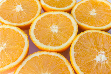 half oranges , sliced orange fruits closeup
