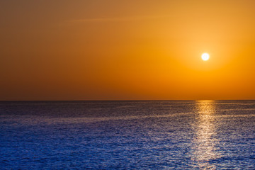 Beautiful sunset above the sea.  Scenic view of beautiful sunset