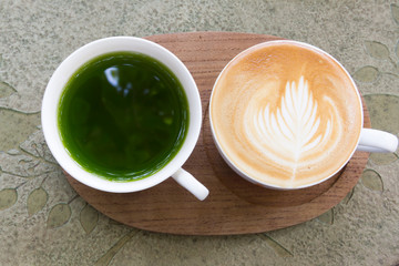 Close up cup of Coffee latte on the wood table