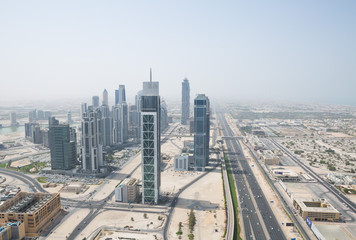 sheik zayed road photographed from the al hikma tower rooftop