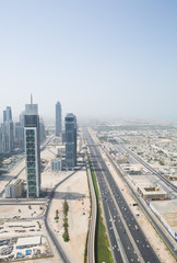 sheik zayed road photographed from the al hikma tower rooftop