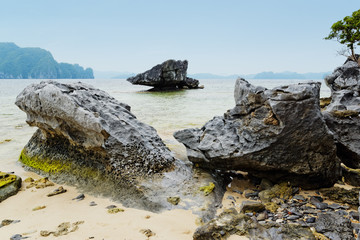 El Nido, Philippines - Rocks on the beach at one of the islands at Bacuit Archipelago