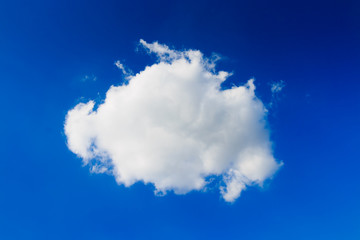 Blue sky background with tiny clouds