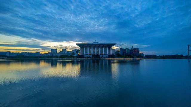 Time lapse 4k Footage of Epic Sunrise At Iron Mosque (Masjid Tuanku Mizan Zainal Abidin), Putrajaya. Showing a moving and changing color clouds. 