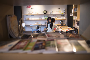 Women have a meeting in a cafe