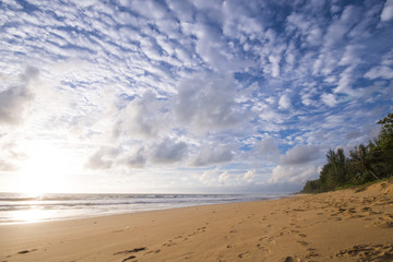 beautiful beach against blue sky and cloud